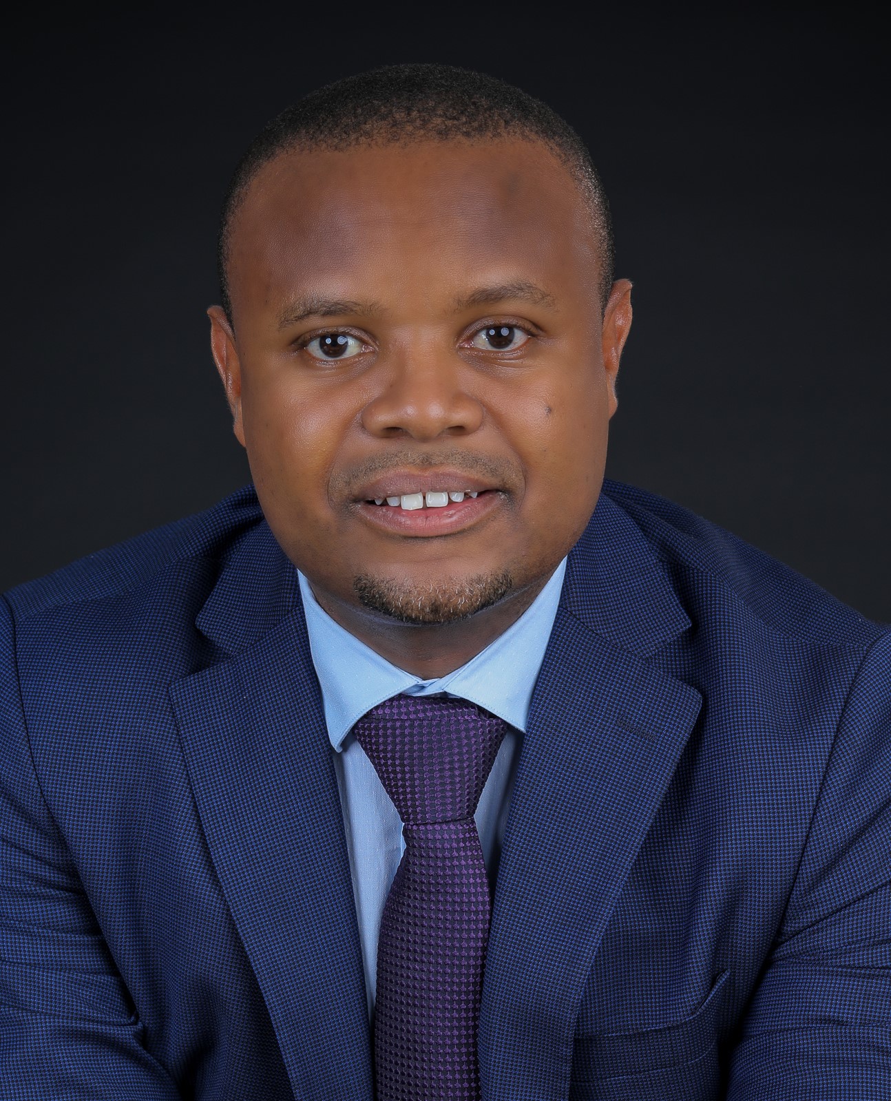 Portrait of Mwakuwona Danson Mwashako